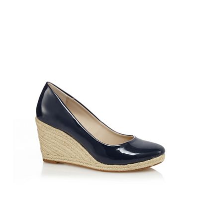 Navy patent high wedge shoes